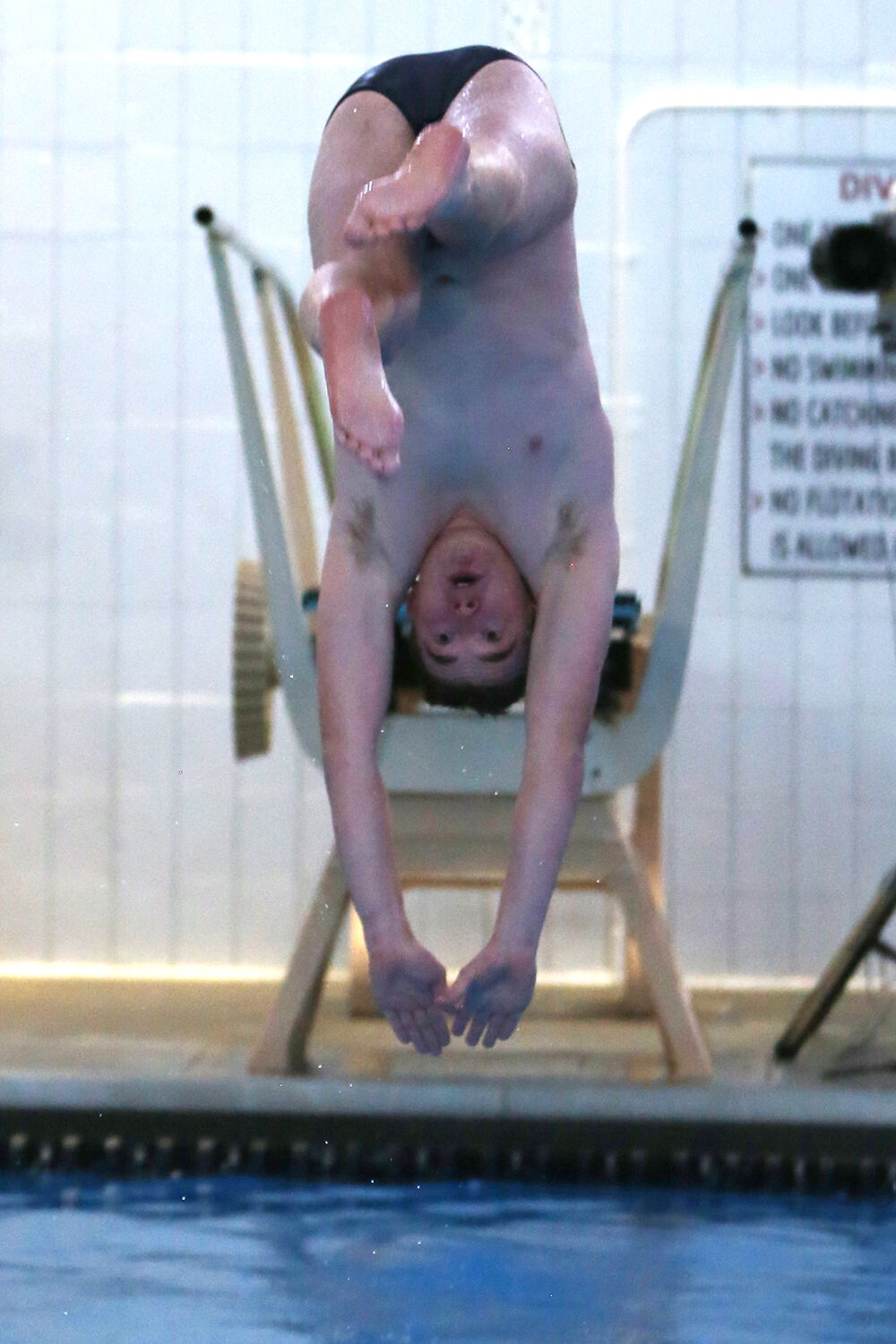 Josiah Bartlett lifts his feet to straight over his head